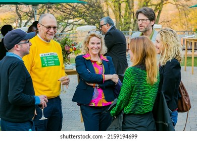 JOHANNESBURG, SOUTH AFRICA - Oct 25, 2021: A number of VIP guests mingling at an outdoor social event in Johannesburg, South Africa