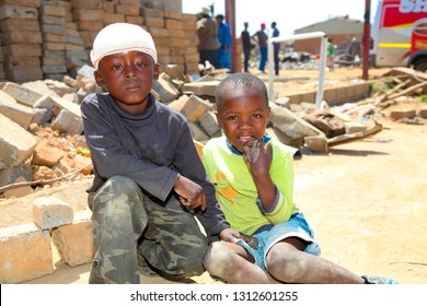 Johannesburg, South Africa - October 04 2011: African Children In A Tornado Damaged Township