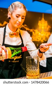 Johannesburg, South Africa - October 11 2018: Female Bartender Pouring A Bitter Cocktail At Food Festival