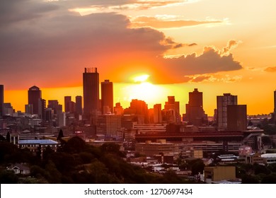 Johannesburg, South Africa - October 16 2012: View Of Johannesburg City At Sunset From A Nearby Hill