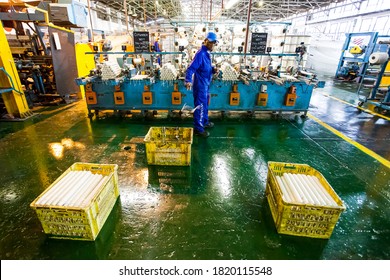 Johannesburg, South Africa - October 16, 2012: African Factory Worker On A Copwinder Weft Assembly Line Loom