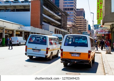 Johannesburg, South Africa - October 17 2012: Mini Bus Taxi On Streets Of Johannesburg