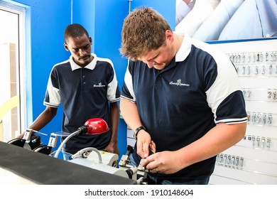 Johannesburg, South Africa - October 2, 2012: Key Cutting service inside a laundromat dry cleaners