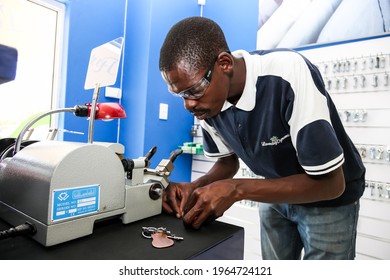 Johannesburg, South Africa - October 2, 2012: Key Cutting service inside a laundromat dry cleaners