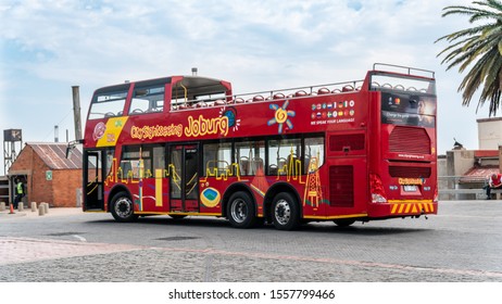 Johannesburg, South Africa - October 2019: Open Top Sight Seeing Bus Waiting For Passengers