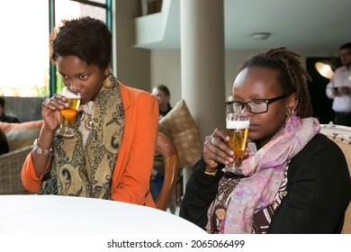 JOHANNESBURG, SOUTH AFRICA - Sep 30, 2021: A Group Of Diverse People At A Beer Tasting Event