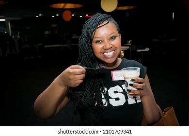 JOHANNESBURG, SOUTH AFRICA - Sep 30, 2021: A Woman Tasting Nescafe Dolce Gusto At Their Product Launch Event In Johannesburg, South Africa