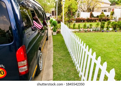 Johannesburg, South Africa - September 10, 2010: Minibus Taxi Van Parked Outside A House In A Wealthy Neighborhood 