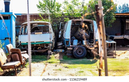 Johannesburg, South Africa, September 11, 2011, Scrapped Mini Bus Taxi In Garden Of Soweto Home 