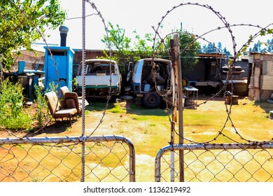 Johannesburg, South Africa, September 11, 2011, Scrapped Mini Bus Taxi In Garden Of Soweto Home 