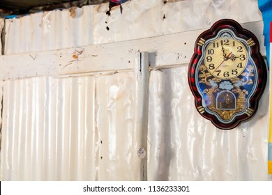 Johannesburg, South Africa, September 11, 2011, Antique Clock On Wall Of Low-income Soweto Home