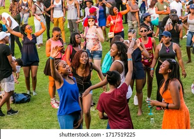 Johannesburg, South Africa - September 11, 2015: Crowd Of Diverse Young People Dancing And Having Fun At Day Time Open Air Concert 