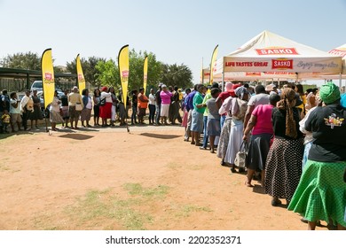 Johannesburg, South Africa - September 17, 2015: African Community Members Outside Town Hall Meeting