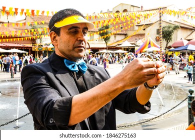 Johannesburg, South Africa - September 22, 2012: Street Magician Performing Tricks And Magic Show For Children At Funfair 