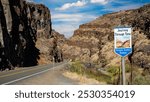 The John Day River and US highway 26 enter Picture Gorge at the start of one of Oregon