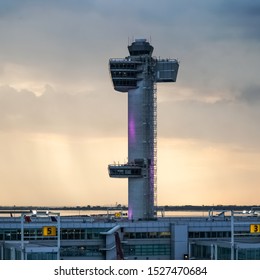 John F. Kennedy Airport (JFK) Air Traffic Control (ATC) Tower As Seen From The Airport Terminal During A Thunderstorm. Queens, New York, USA, October 2, 2019.