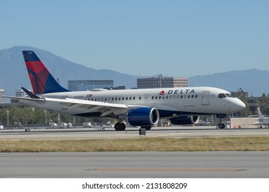 John Wayne Airport, California, USA - February 19, 2022: image of Delta Air Lines Airbus A200-100 with registration N115DU shown taxiing.