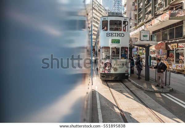 JOHNSTON\
ROAD, HONG KONG - DECEMBER 10, 2016: Hong Kong Tramways is a public\
transport in metropolis. Known as \