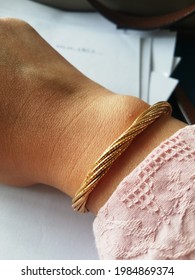 Johor Bahru, Malaysia, 20 April 2021, A Gold Bangle Wears By A 38 Years Old Malay Woman At Workplace