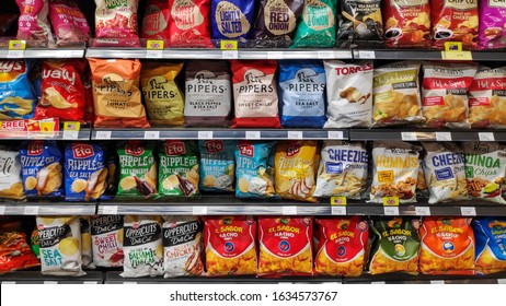 Johor Bahru, Malaysia- 25 Jan, 2020: Wide Selection Of Potato Chip Or Junk Food On Shelf Display In A Convenient Store.