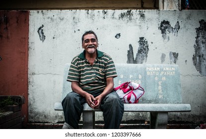 JOHOR, MALAYSIA, JUNE 4 2015: Wet Market. A Malay Uncle Is Resting While Waiting To Go Home After Buying Goods In The Market.