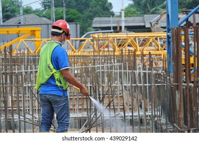 JOHOR, MALAYSIA -MARCH 29, 2016: Construction Workers Spraying The Anti Termite Chemical Treatment To The Soil At The Construction Site. 