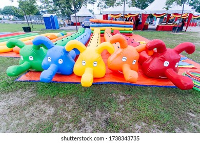 Johor,Malaysia - February 12,2020 : Outdoor Game Types For Family Day Event. Giant Soccer, Giant Snooker And Inflatable Game 