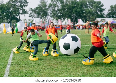 Johor,Malaysia - February 12,2020 : Outdoor Game Types For Family Day Event. Giant Soccer, Giant Snooker And Inflatable Game 