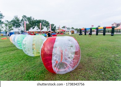 Johor,Malaysia - February 12,2020 : Outdoor Game Types For Family Day Event. Giant Soccer, Giant Snooker And Inflatable Game 