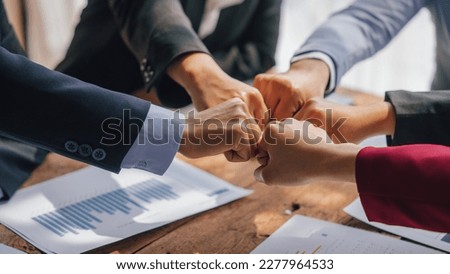 Join hands, teamwork, Team of lawyers and tax auditors brainstorming together and calculating the balance sheet and historical financial accounts of the company and shareholders.
