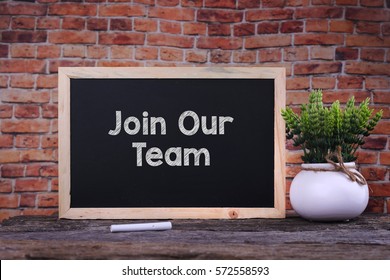 Join Our Team Word On Blackboard With Green Plant