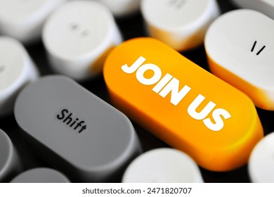 Join Us is an invitation or call to action inviting someone to become a member of a group, organization, team, community, or initiative, text button on keyboard - Powered by Shutterstock