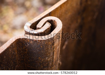 joined rusty metal plate at construction site