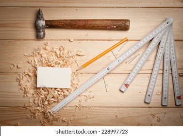 Joinery Tools On Wood Table Background With Business Card And Copy Space