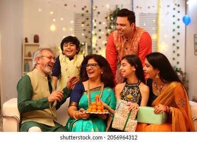 Joint family celebrating diwali at home with full of happiness - Shutterstock ID 2056964312