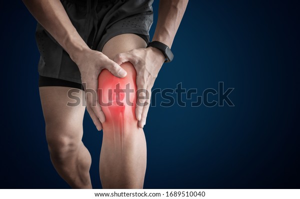 Joint pain, Arthritis and tendon problems. a man\
touching nee at pain\
point