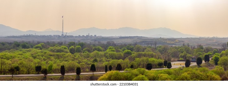 JOINT SECURITY AREA, PANMUNJEOM, SOUTH KOREA - APRIL 2008: Tallest Flag Pole In The World With North Korean Flag In Kijong-dong Village And Site Of The Axe Murder In The Foreground