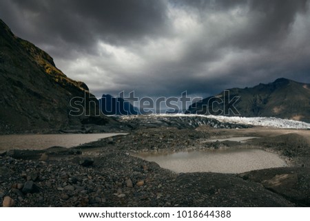 Similar – Mountains in Iceland are reflected in the water