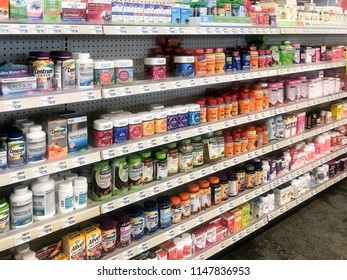 Joliet, Illinois / USA - May 29, 2018: Photo Of The Vitamin And Supplement Aisle In A CVS Pharmacy. Shelves Filled With Colorful Bottles And Packages