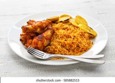 Jollof Rice With Chicken And Fried Plantain, West African Cuisine