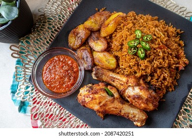 Jollof rice is a popular rice dish in West Africa! It originated from Senegal and spread through different countries in West Africa. - Shutterstock ID 2087420251