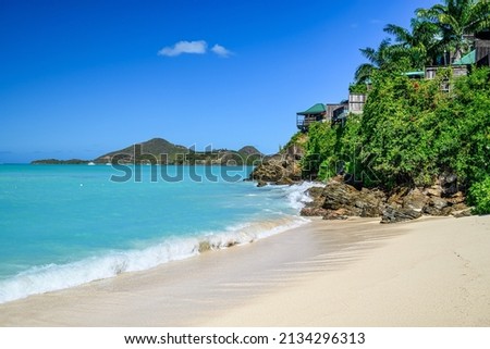 Jolly Beach a beach in Antigua in the Caribbean with azure blue sea