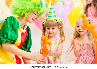 Jolly Kids Group And Clown On Birthday Party