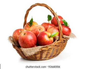 Jonagold apples in a basket on white background - Shutterstock ID 92668306