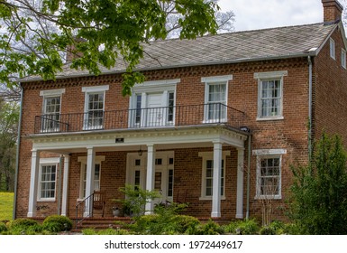 Jonesborough, Tennessee, USA - May 2, 2021:  Historical Cherokee Creek Farm House Built In 1830. 