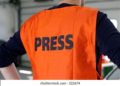 Journalist Wearing Press Safety Vest.