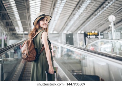 Journey At Airport Terminal  , Asian Woman Traveler Walking Dragging A Suitcase To Gate In Airport