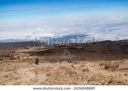 Journey Down the Rugged Trails of Kilimanjaro’s Majesty