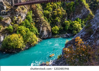 Journey To The South Island Of New Zealand. A Picturesque River In A Mountain Gorge. Attraction Bungee Jumping On A Bridge Over A Mountain River. Concept Of Active, Extreme And Ecological Tourism