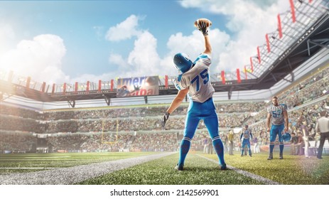 Joy in football. American football player celebrating victory at professional sports stadium during daytime. Ball in hand. View from the back - Powered by Shutterstock